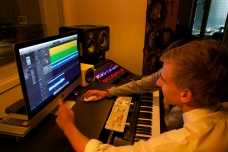Students working on Logic Pro in "Studio 1"